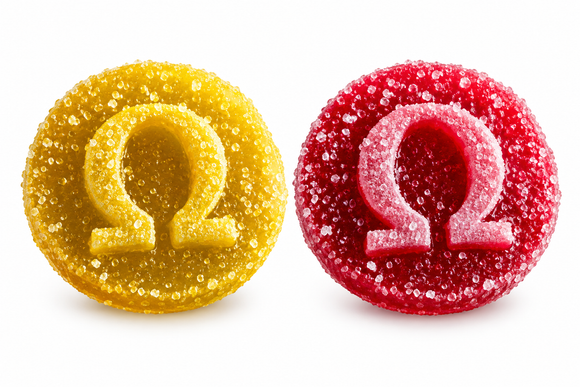Two sugar-coated 7OHMZ omega logo gummies isolated on a white background